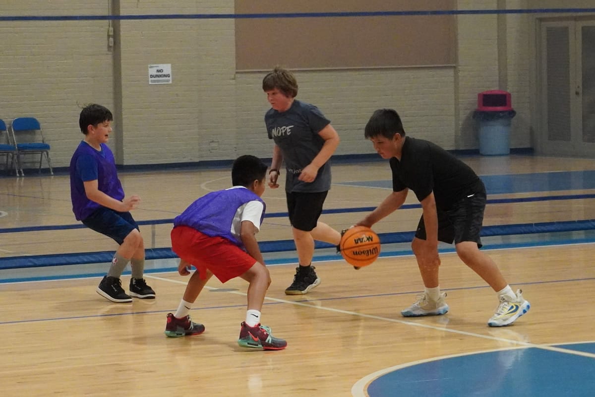 youth playing basketball at WWMB