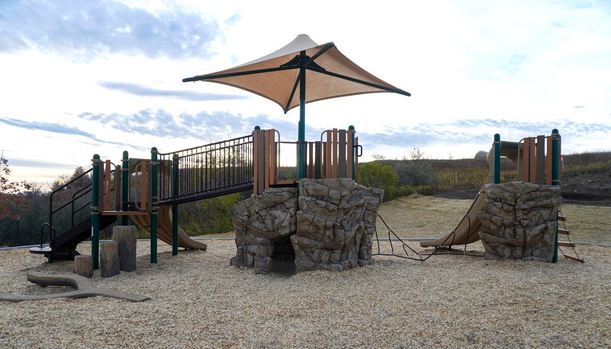 green and tan playground at Hay Creek Park