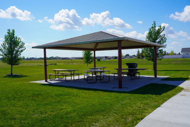 shelter with four picnic tables at Hidden Star Park
