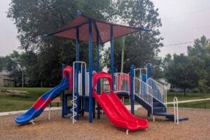 blue, red, and white playground at Marian Park
