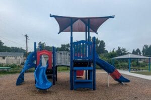 blue, red, and white playground at Marian Park
