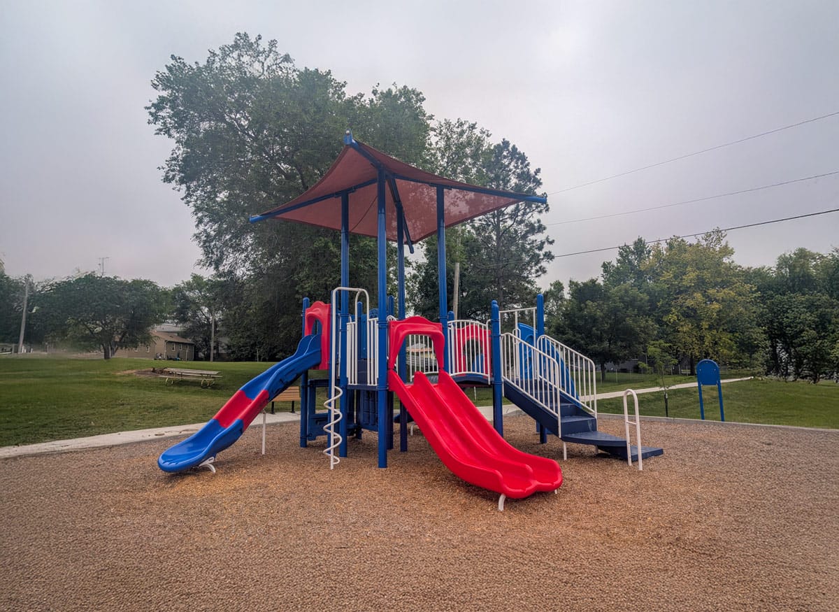 blue, red, and white playground at Marian Park