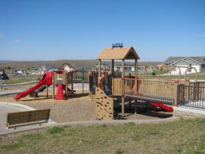 tan and red playground at New Generations Park