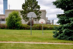 basketball court at Optimist Family Park with two hoops