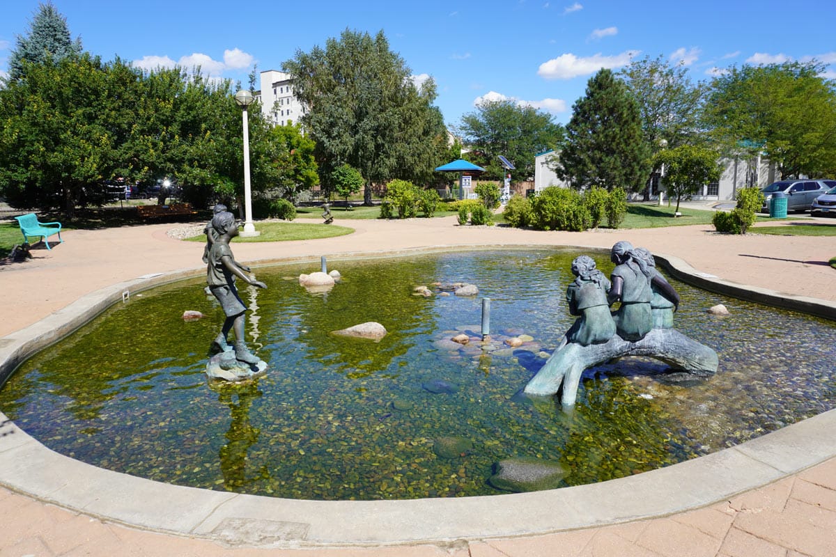 fountain with statues of children playing at Peace Park