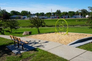 park bench and playground feature at Zonta Park