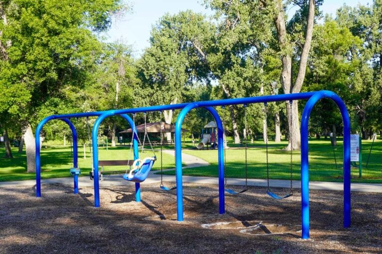 blue swing set near shelter 6 at Sertoma Park