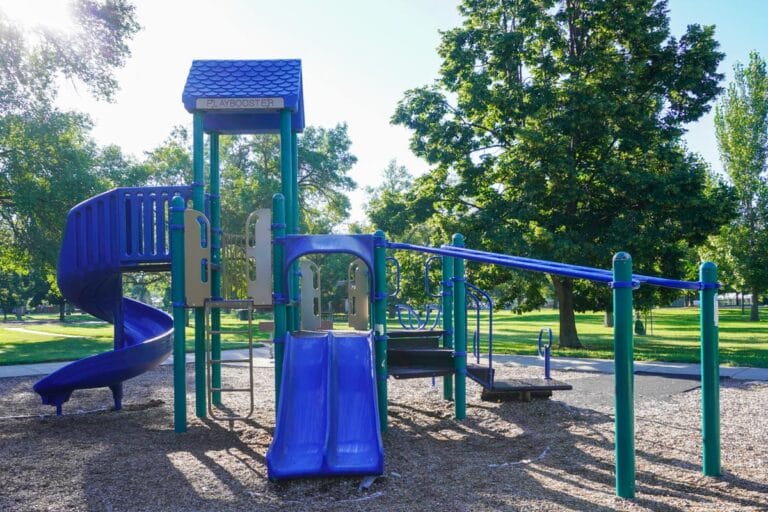 blue, green, and tan playground near shelter 6 at Sertoma Park