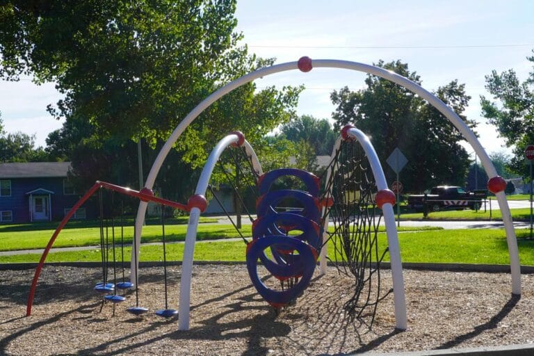 red, white, and blue, playground near shelter 9 at Sertoma Park