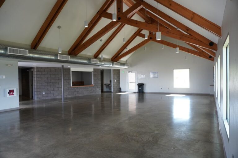 wide angle view of the Farwest Rotary Community Center facing the kitchenette and bathrooms.