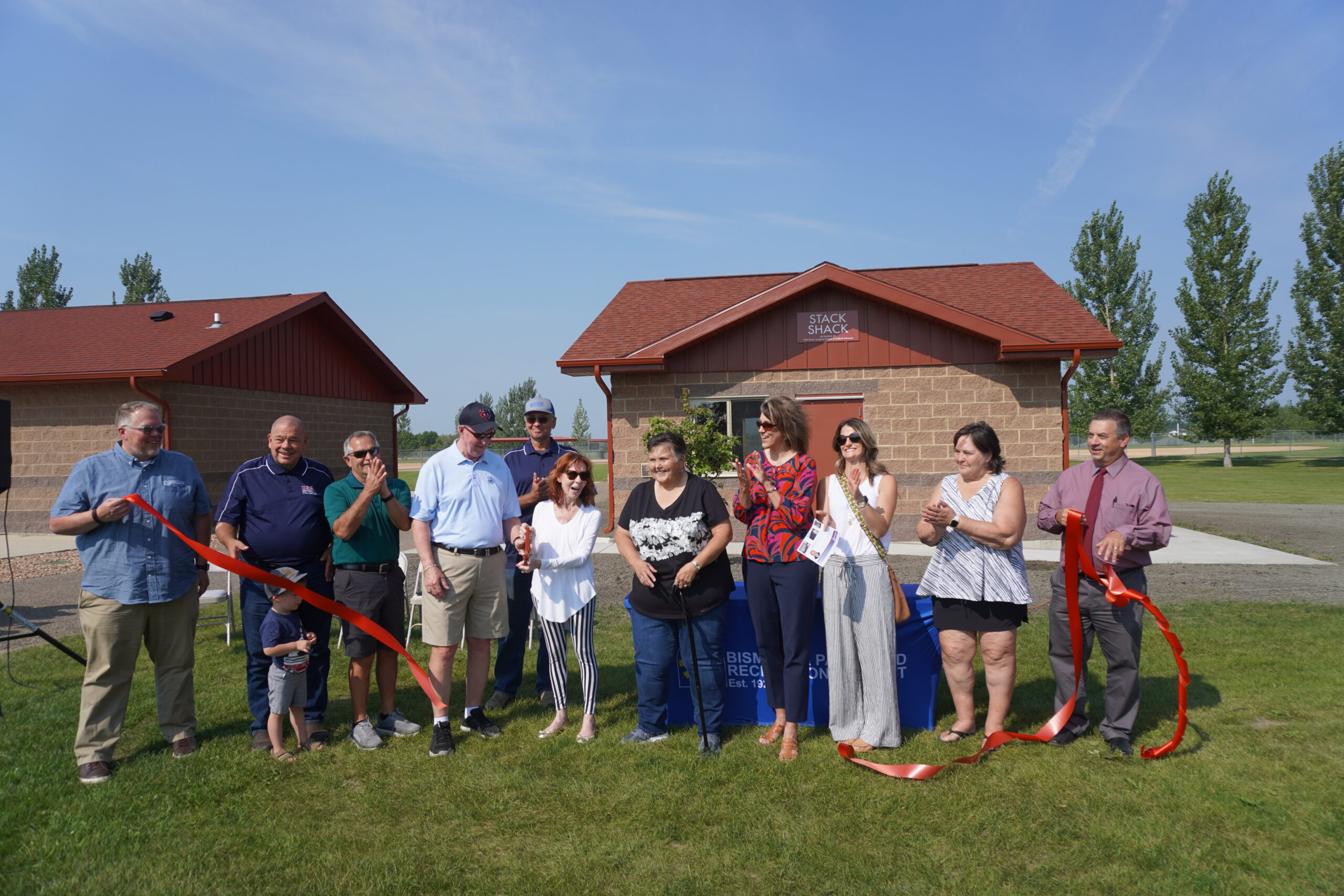 Campaign committee and speakers at ribbon cutting