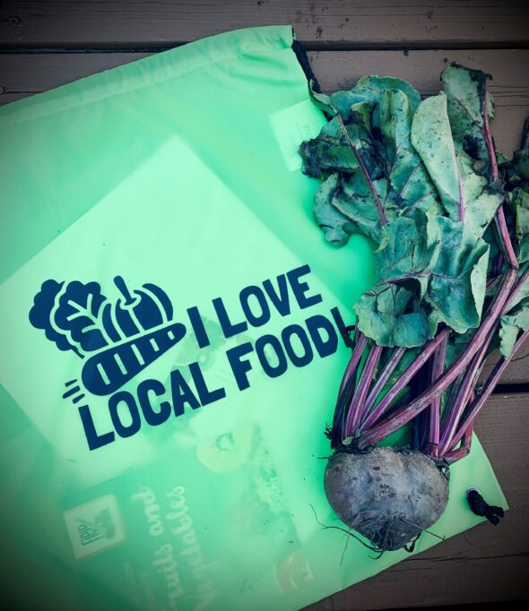 bag with logo 'i love local food' on it, along with a red beet