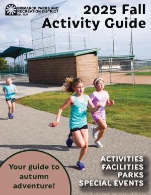 2025 Fall Activity Guide Cover with girls running during a cross country meet